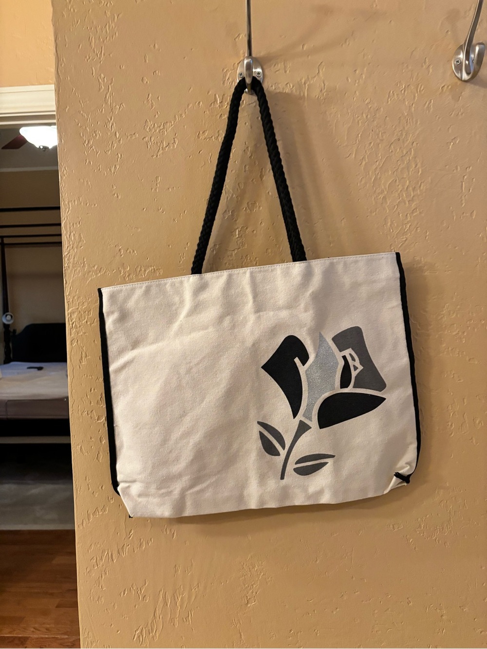 Lancome White Canvas Tote with Black Floral Motif